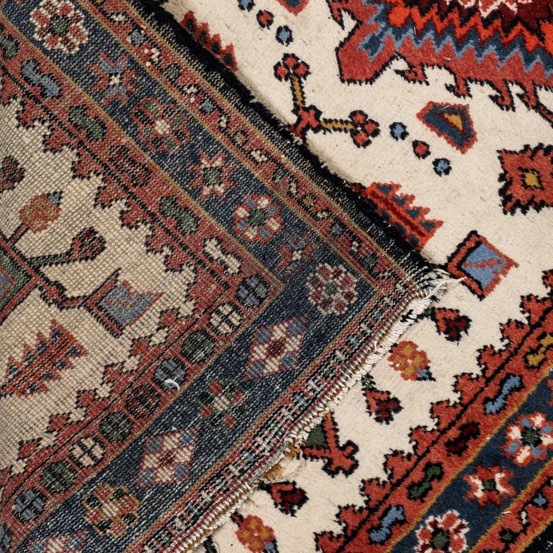 A small Turkey red ground rug together with a group of four further modern Oriental rugs (5)The - Image 7 of 11