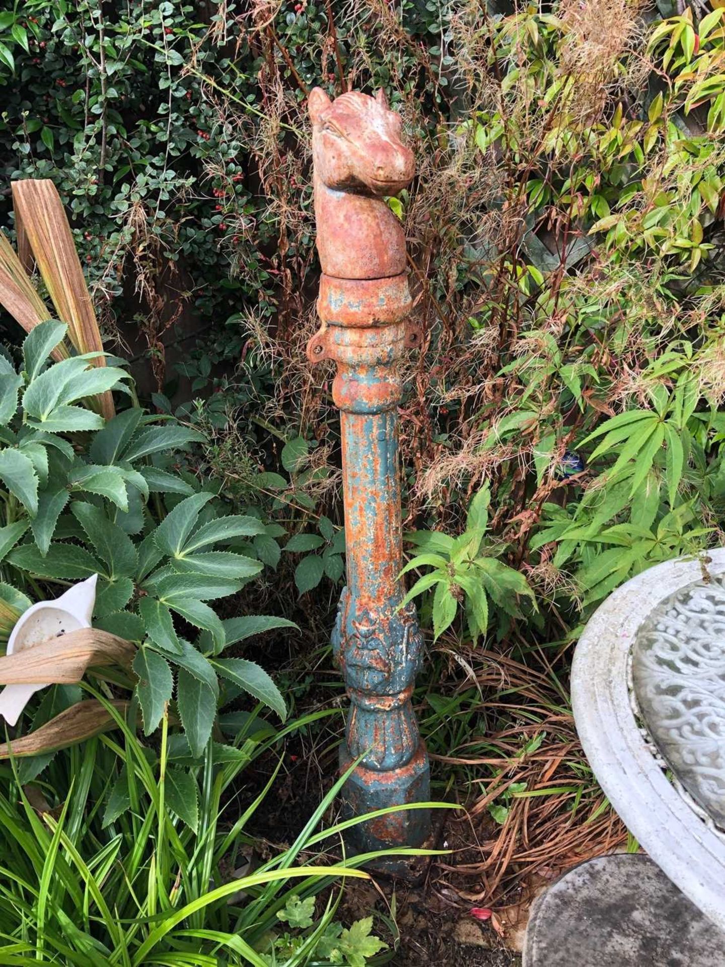 A partially painted cast iron column with horse head terminal, 121cm high overallGeneral corrosion - Image 3 of 3