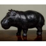 In the manner of Dimitri Omersa for Abercrombie & Fitch, a leather model of a hippo, possibly