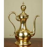 An 18th century Dutch brass coffee pot with scrolling handle, possibly Colonial, 39cm highMinor