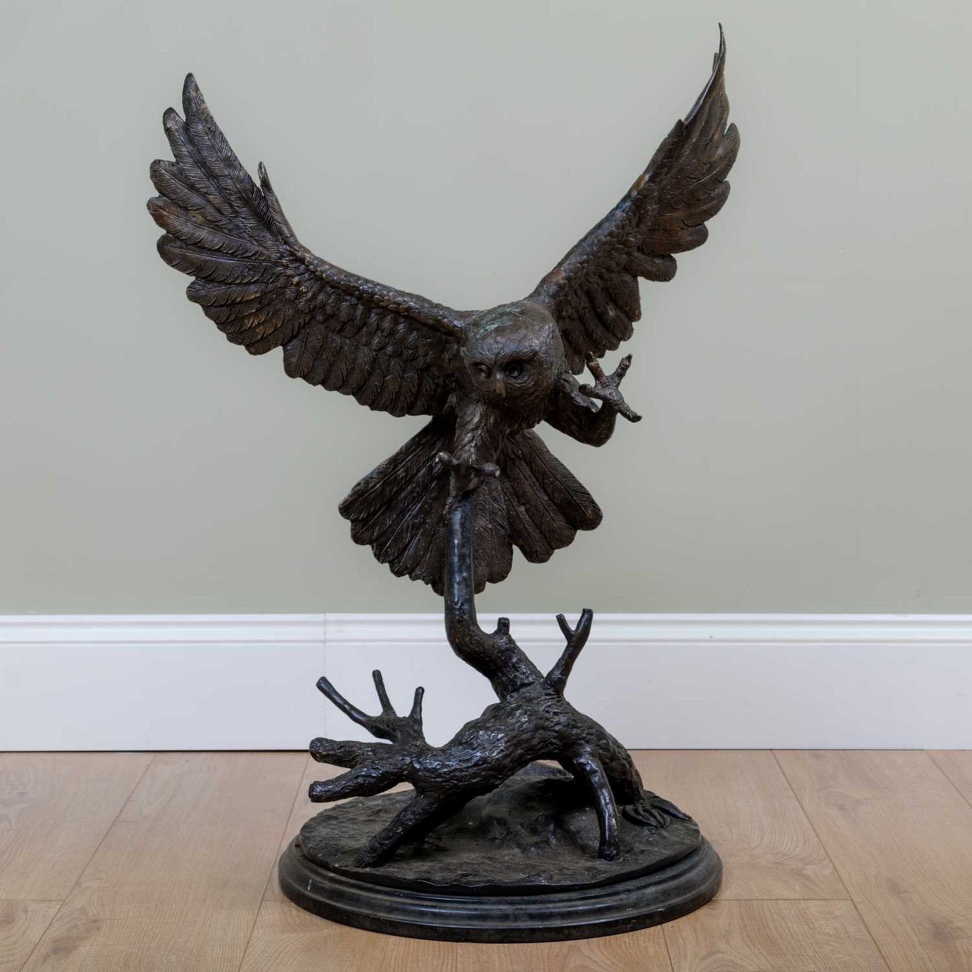 After Jules Moigniez (1835-1894) bronze sculpture of an owl with talons outstretched, on a