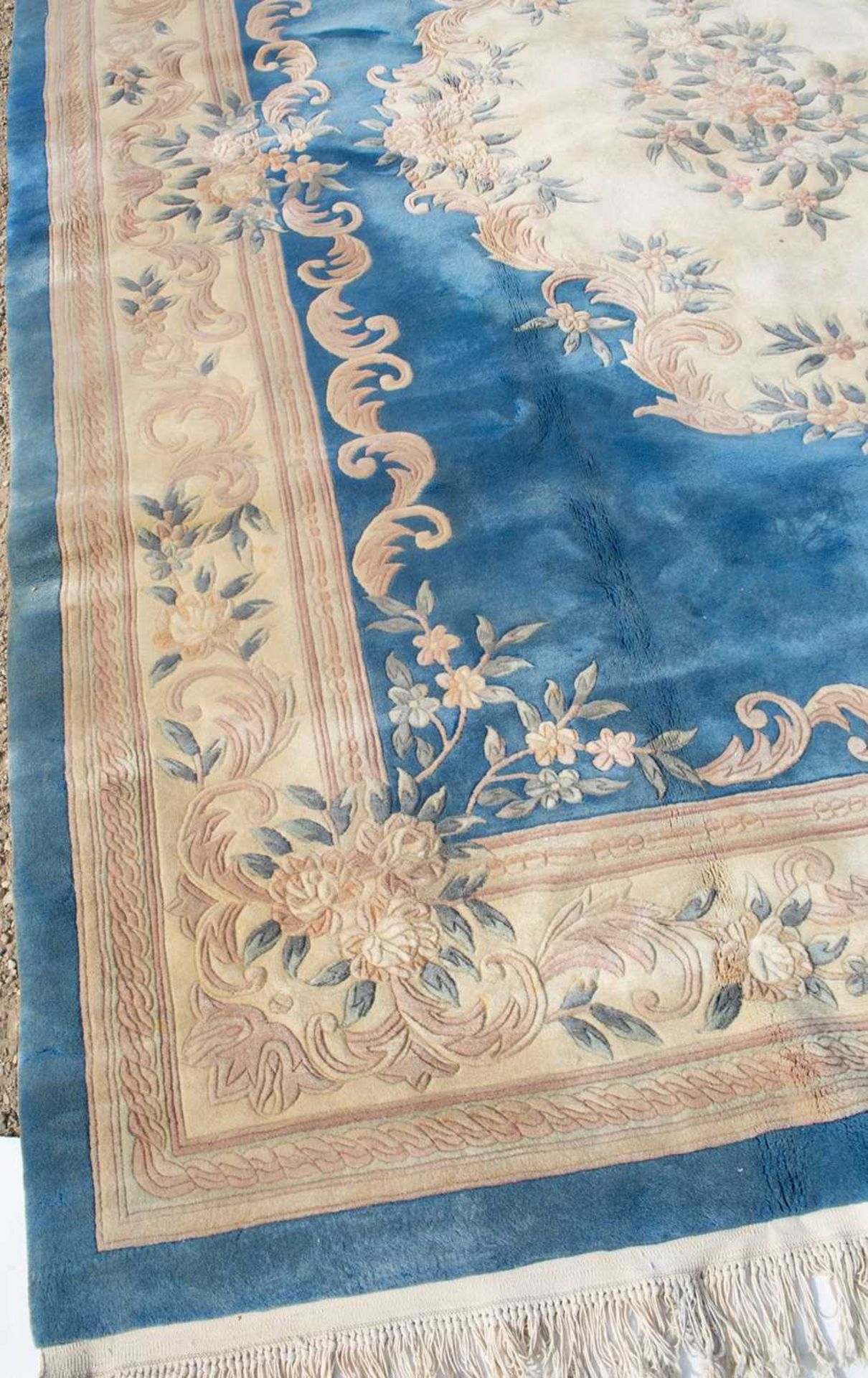 A Chinese blue ground carpet with stylized floral design and blue outer border, 367cm x 272cmFaded - Image 2 of 3