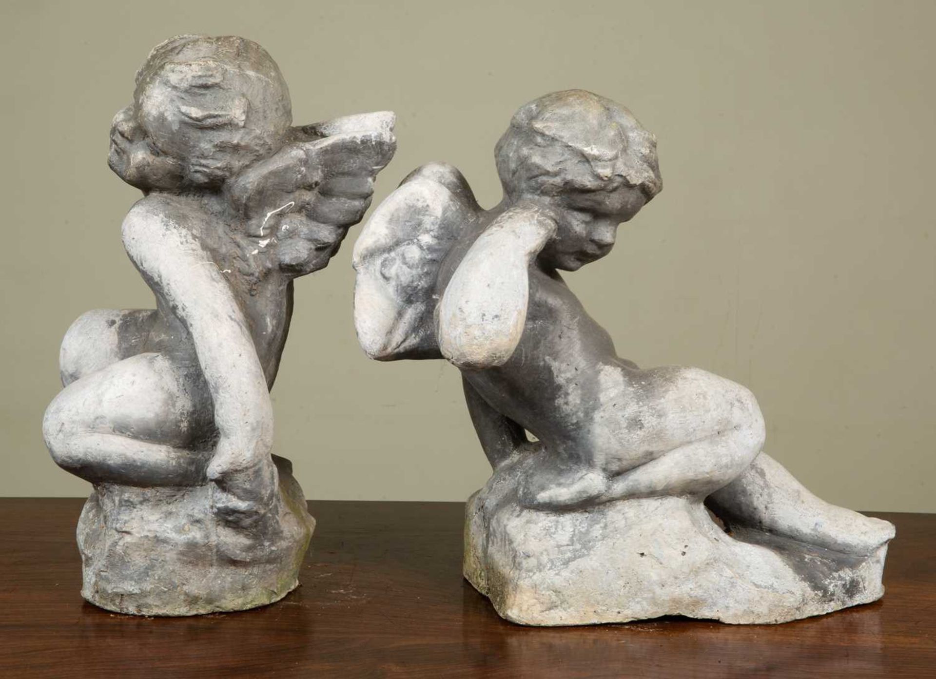Two antique lead cherubs each in a playful pose, both approximately 36cm in height x 20cm wideSome - Image 4 of 4