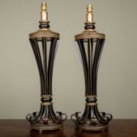 A pair of modern black and parcel gilt painted table lamps with scrolling ornament, 15cm diameter