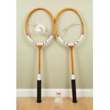 A pair of oversized shop display Slazenger badminton rackets, each 180cm high; together with a