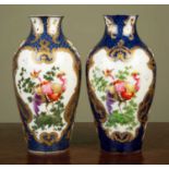 A pair of faux Worcester porcelain baluster vases decorated with exotic birds, probably Sampson,