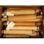 A collection of twenty three North Country sycamore and beechwood rolling pins of various forms, the