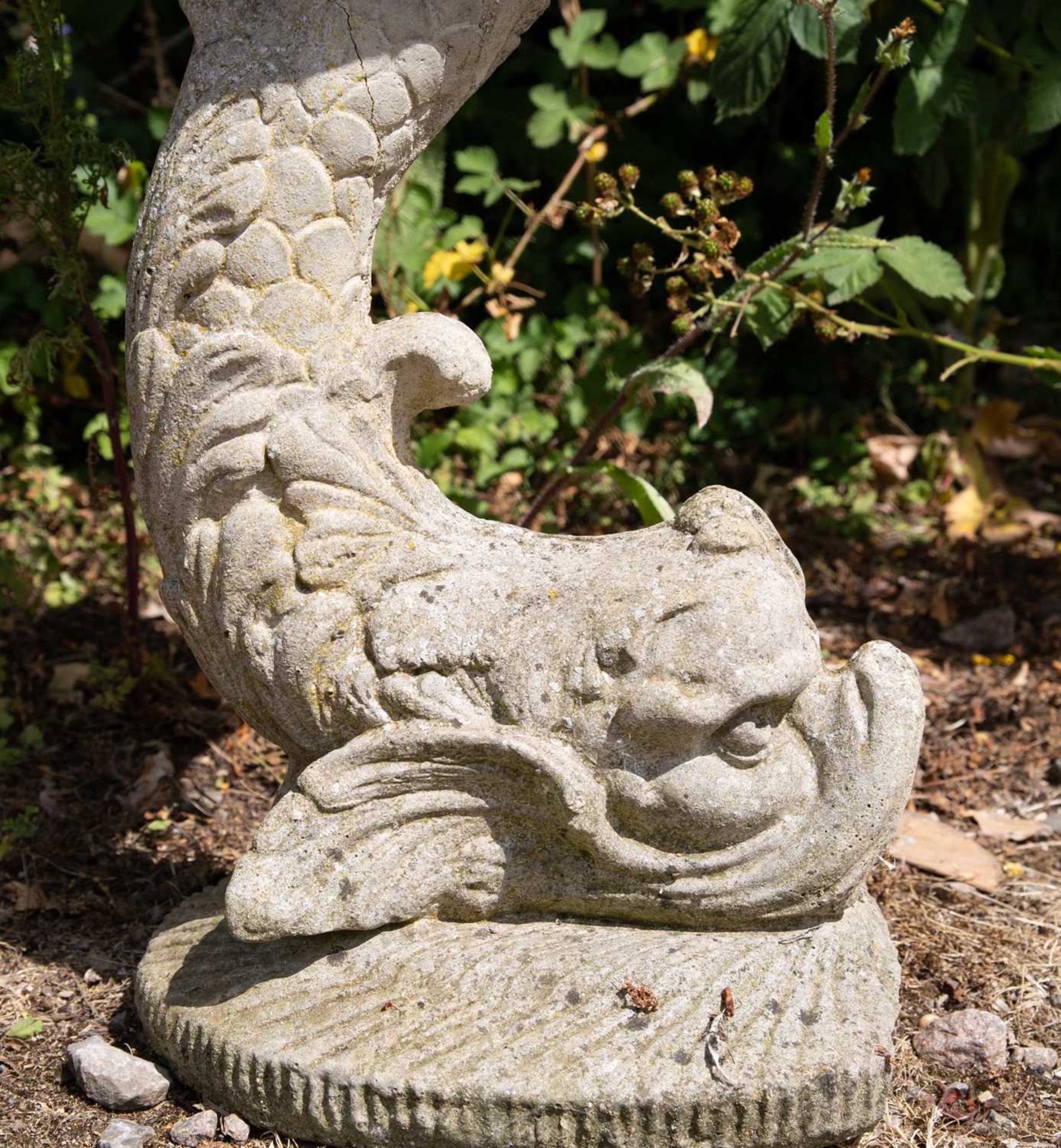 A cast reconstituted stone bird bath in the form of a shell supported by a dolphin, 52cm wide x 76cm - Image 4 of 5