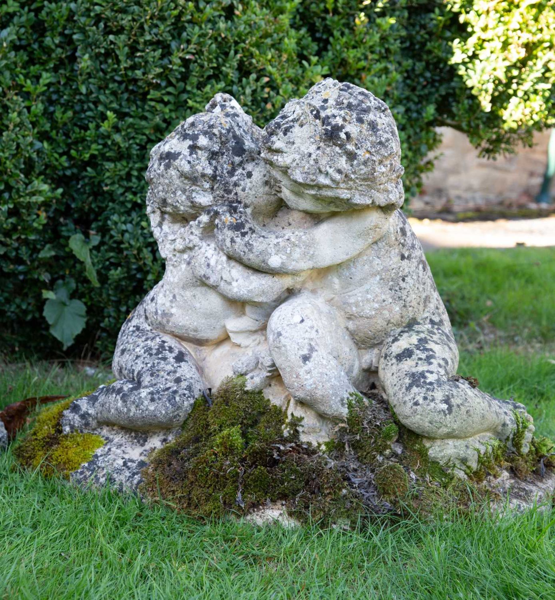 Two cast reconstituted stone groups of putti, each 64cm wide x 48cm high (2)Qty: 2In weathered - Image 2 of 6