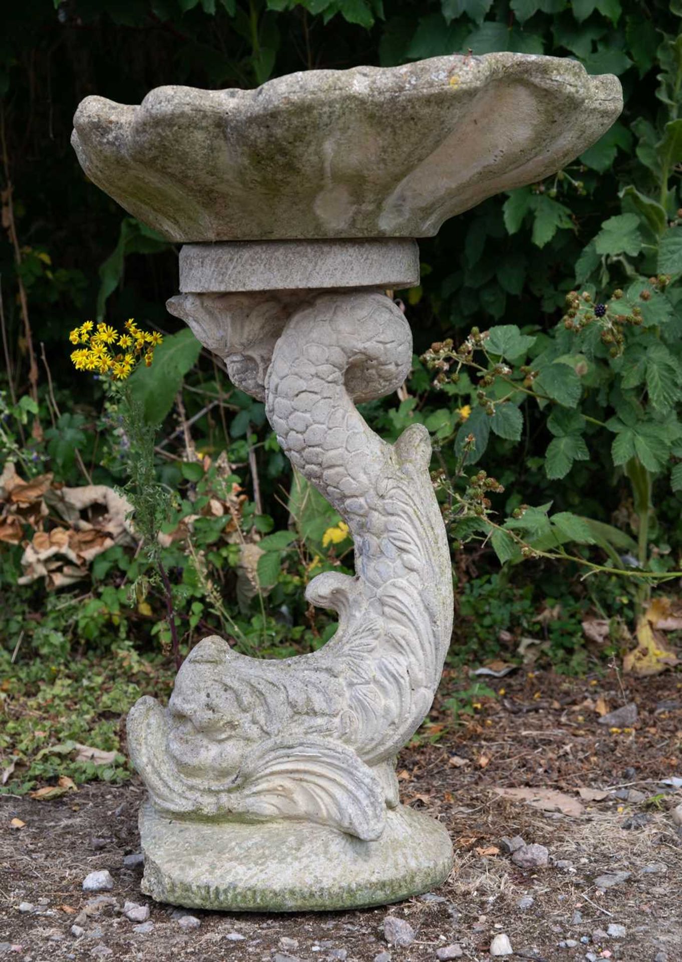 A cast reconstituted stone bird bath in the form of a shell supported by a dolphin, 52cm wide x 76cm - Image 5 of 5