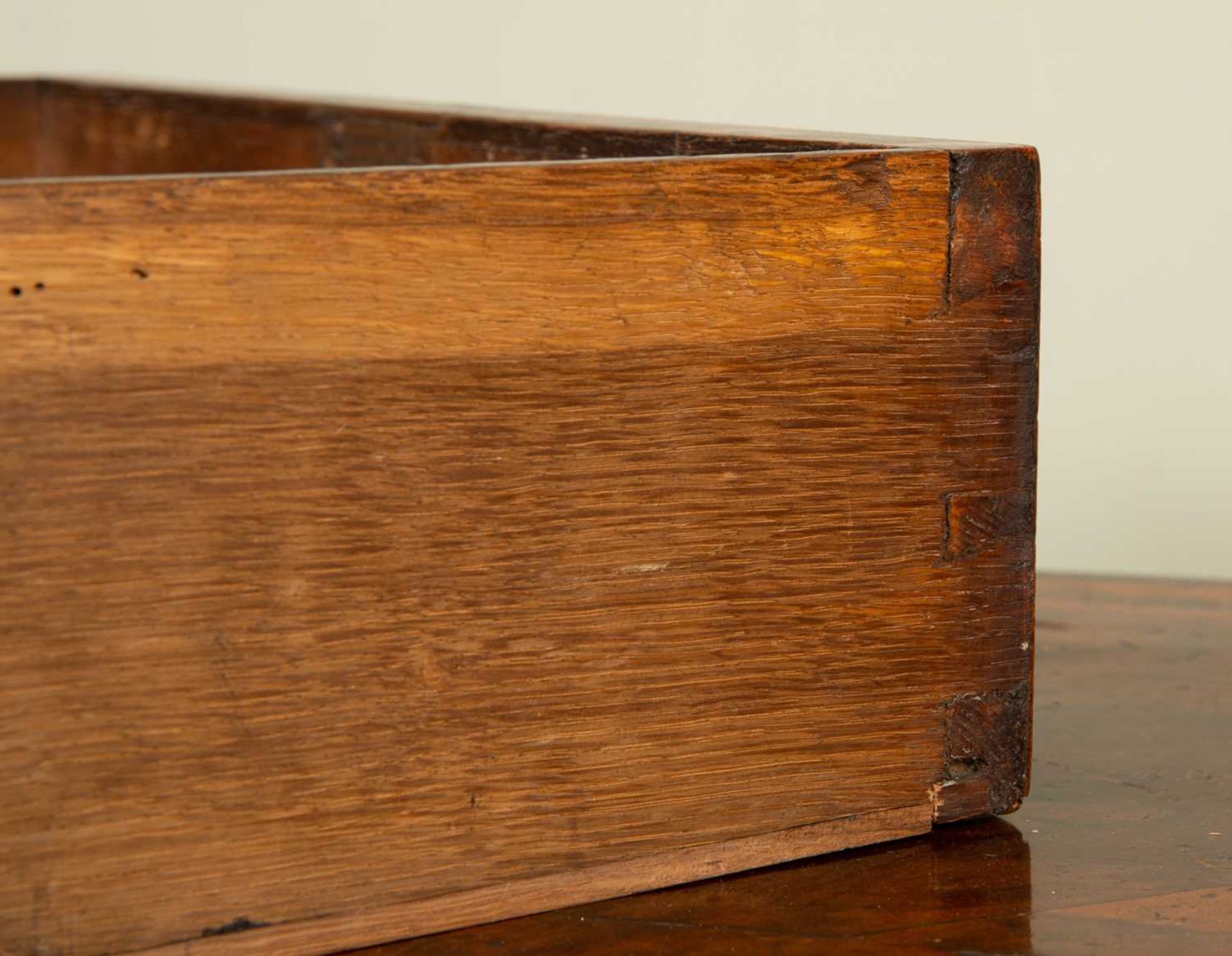 A George II walnut chest of two short and three long drawers standing on bracket feet, the quartered - Image 3 of 5