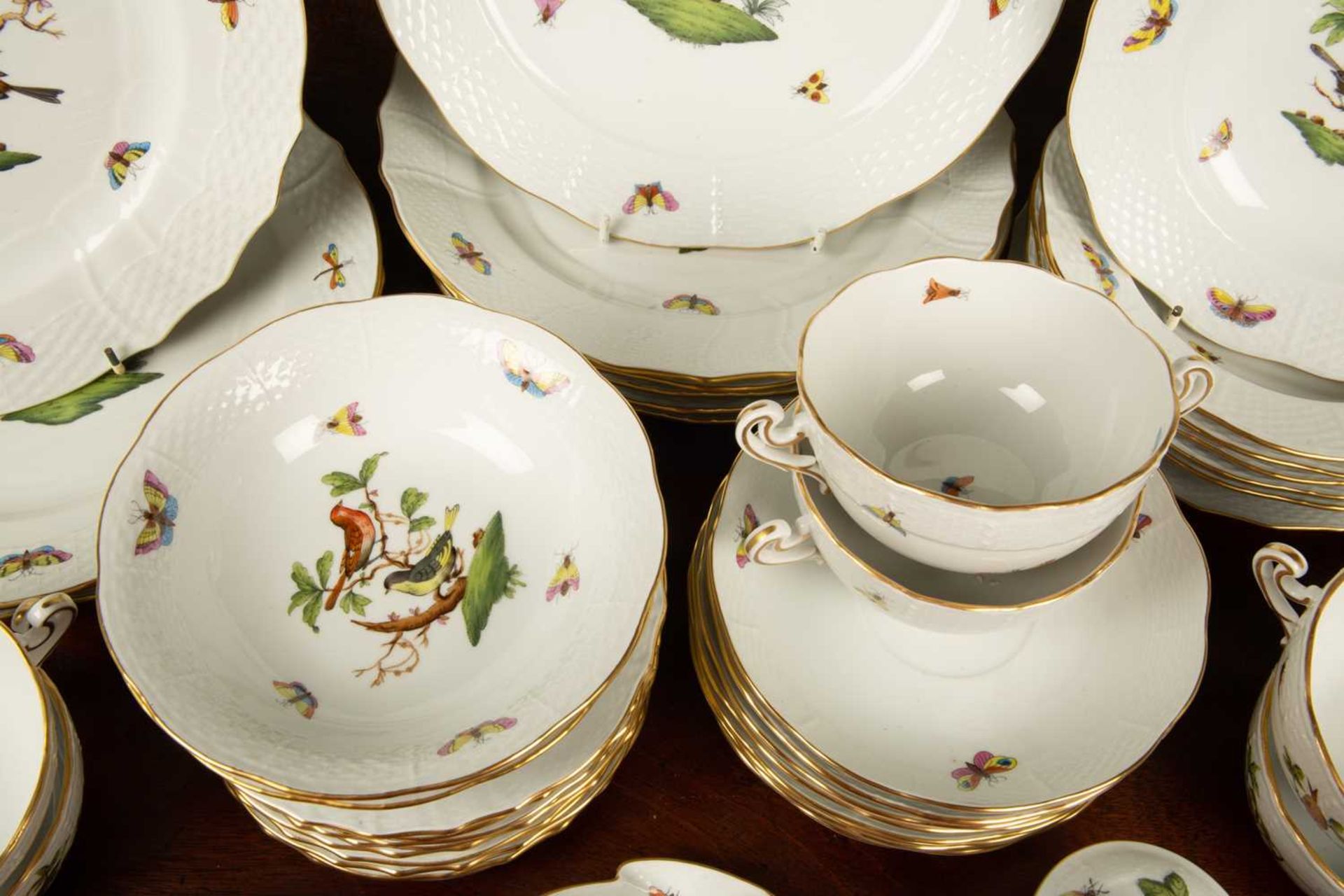 A Hungarian Herend porcelain part dinner service decorated with birds and butterflies and with a - Image 3 of 9