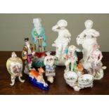 A group of decorative porcelain to include a bow figurine of a girl holding a lamb, circa 1780, 15.