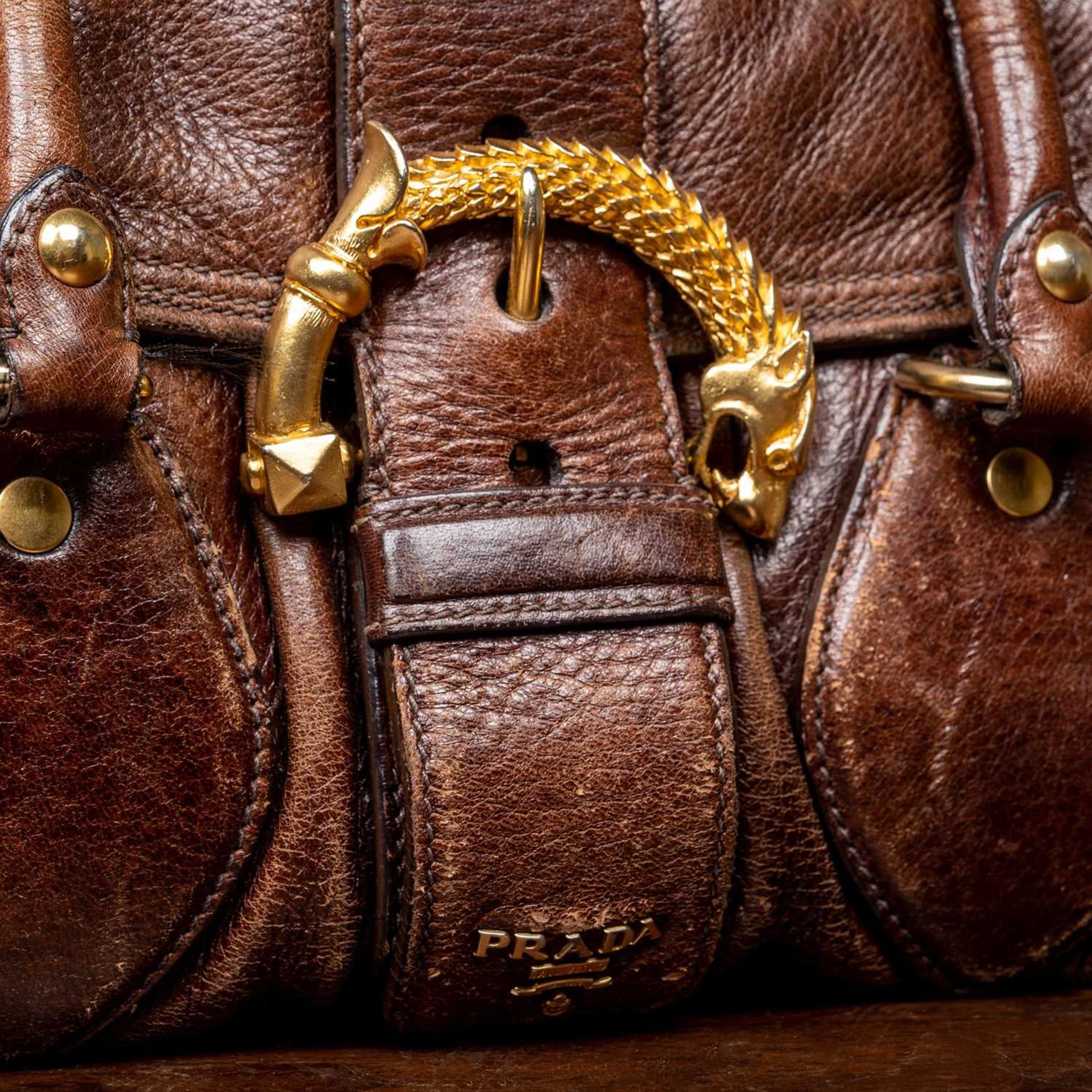 A ladies Prada Cervo dragon buckle brown leather bag with additional brown leather tags and - Image 2 of 10