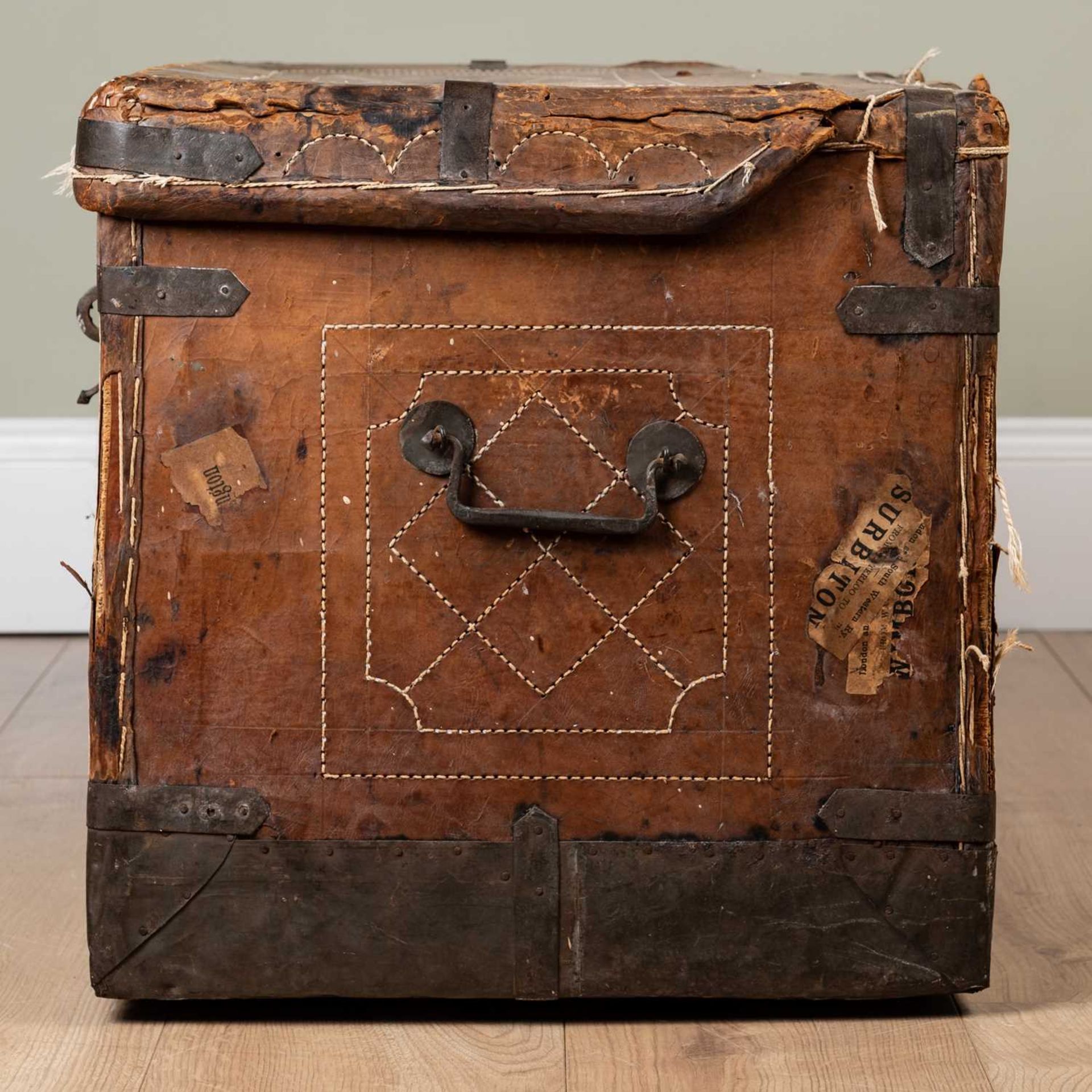 A 19th century leather and iron bound trunk with wrought iron carrying handles to the side and - Image 4 of 7