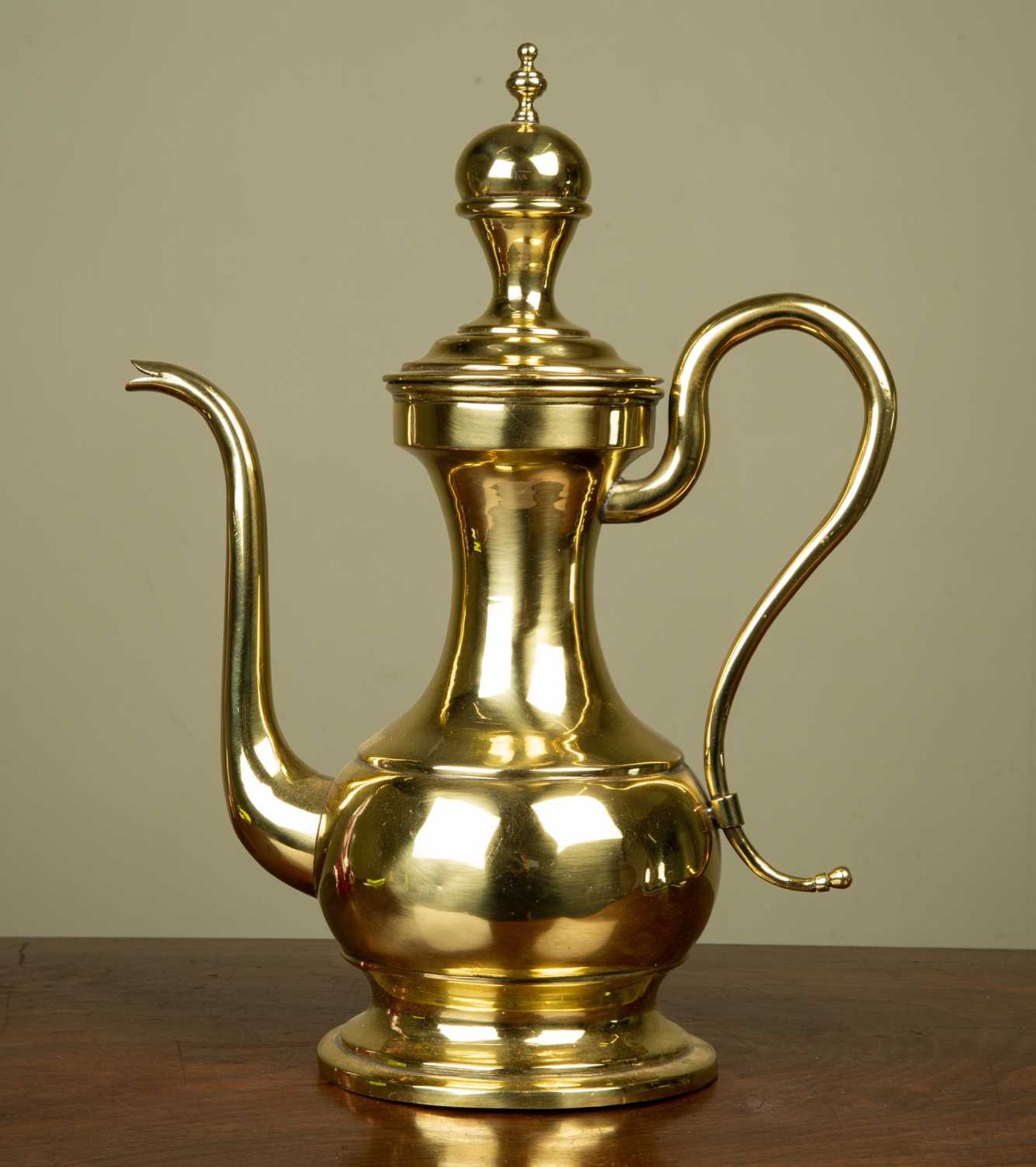 An 18th century Dutch brass coffee pot with scrolling handle, possibly Colonial, 39cm highMinor - Image 2 of 2