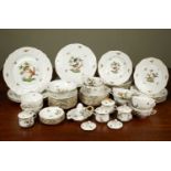 A Hungarian Herend porcelain part dinner service decorated with birds and butterflies and with a