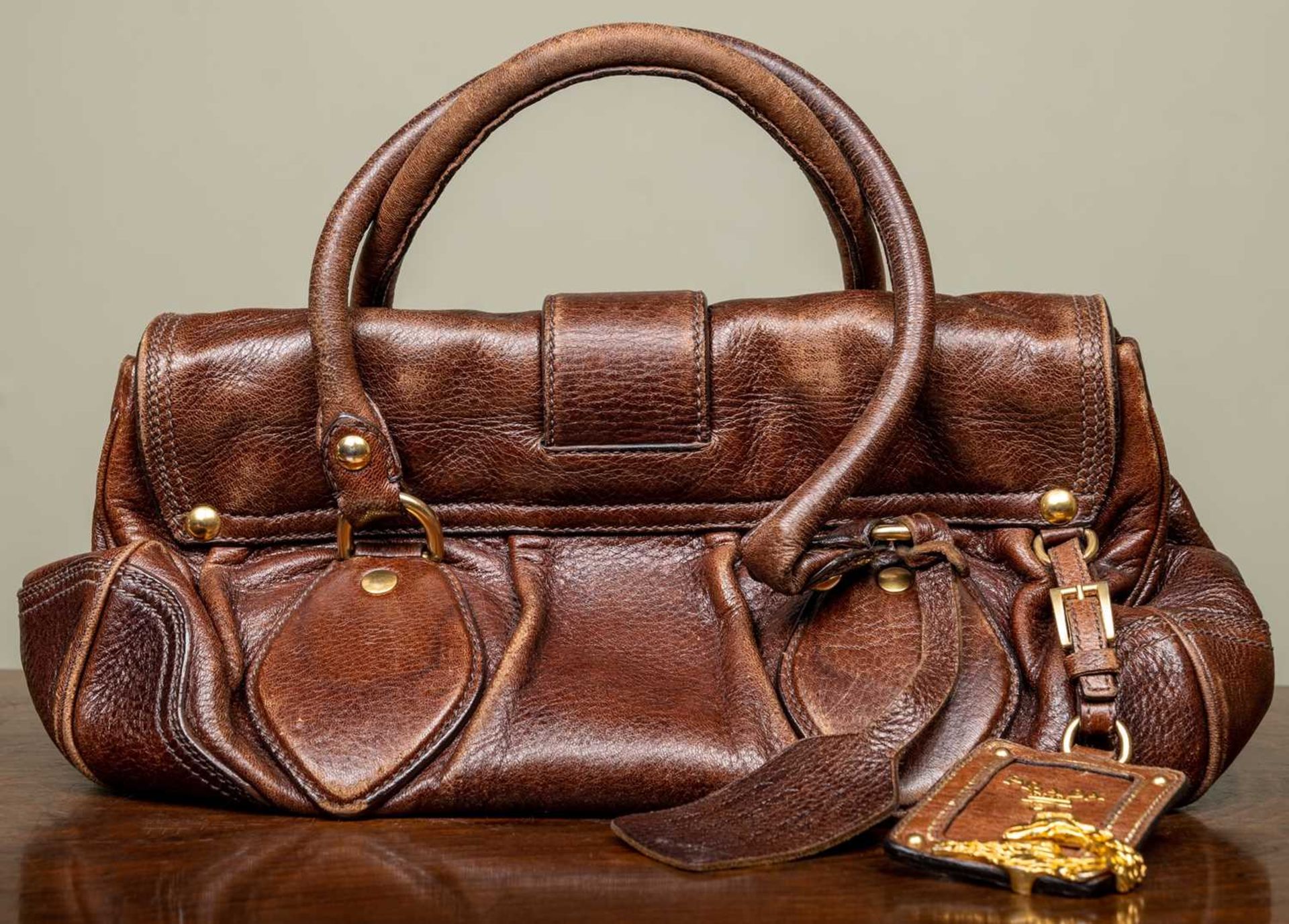 A ladies Prada Cervo dragon buckle brown leather bag with additional brown leather tags and - Image 4 of 10