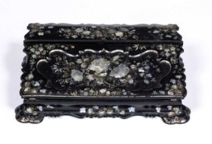 A Victorian black lacquered papier mâché writing slope with mother of pearl inlaid decoration,