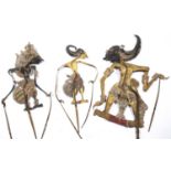A group of three early 19th century Indonesian shadow puppets constructed from painted velum and