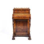 A Victorian burr walnut piano top davenport with a pop up top, four side drawers with turned knob