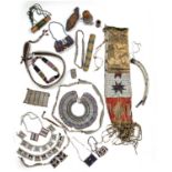 A small collection of early 20th century African tribal beadwork to include gourd vesselsAt present,