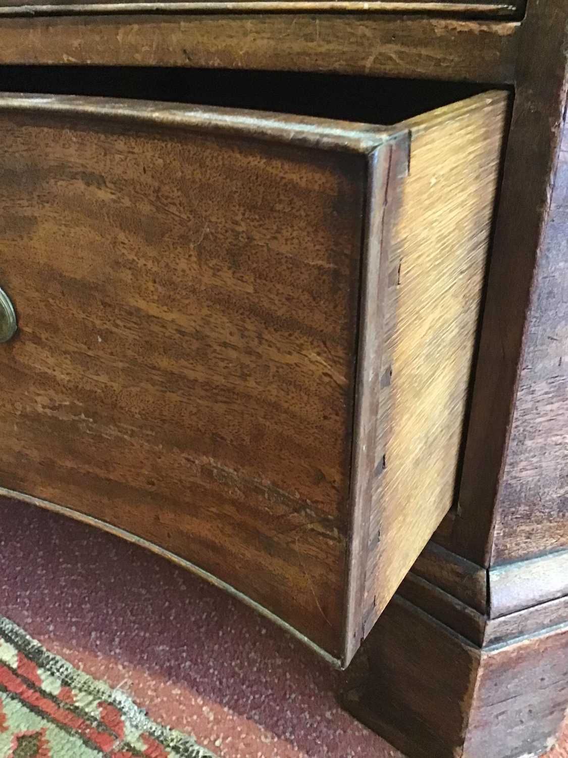 A George III mahogany serpentine chest of four long graduated drawers having brass swan neck handles - Image 18 of 25