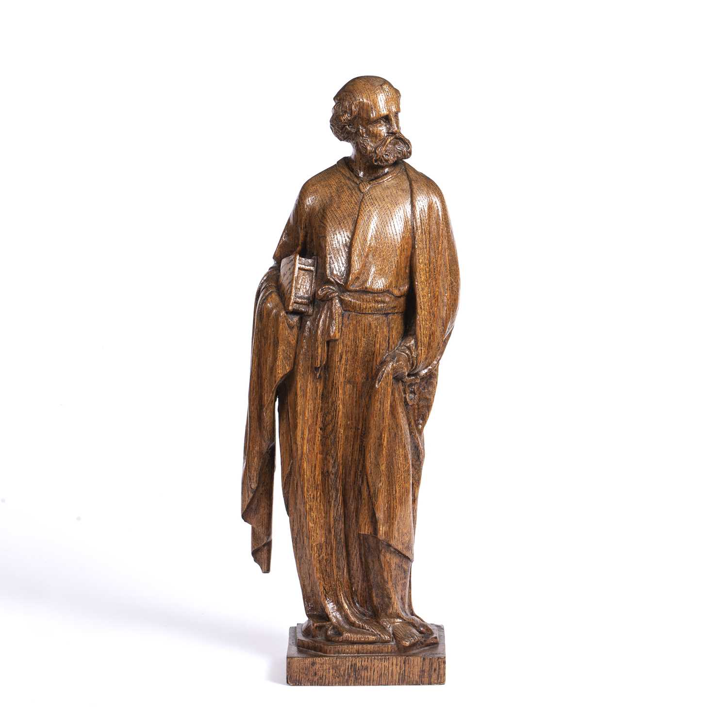A 19th century carved oak figure, of St. Peter, standing with bible and key, on plinth base, 62.