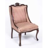 An Edwardian mahogany upholstered chair with a carved ribbon crest and cabriole legs, 56cm wide x
