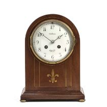 An Edwardian mahogany mantel clock with convex white enamel Arabic dial signed Benson, Ludgate Hill,
