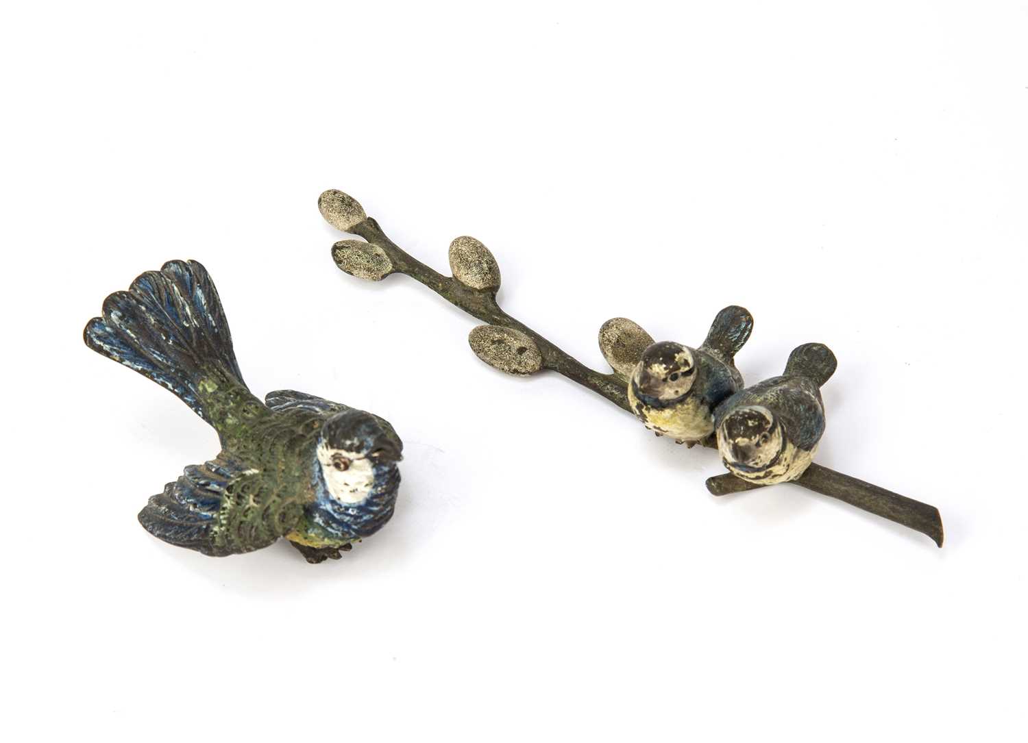 An early 20th Austrian cold painted bronze song bird 7cm wide and two blue tits perched on a