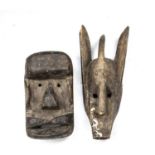 An African tribal Bamana Kore mask Mali 16 x 30cm, together with a further Bamana Kore mask, 15cm