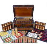 A Victorian Benetfink & Co games compendium with a burr walnut case, ebony and boxwood chess and
