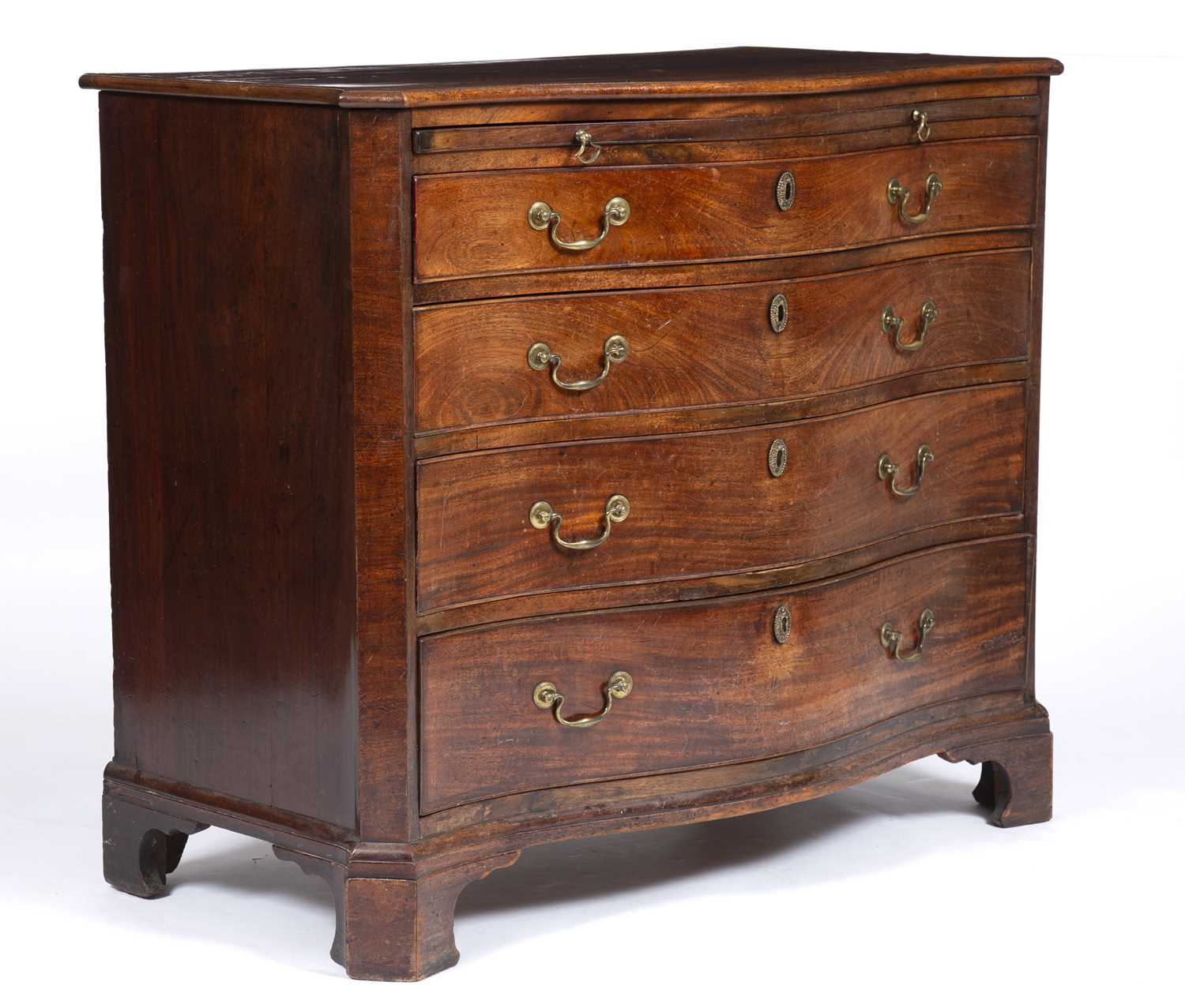 A George III mahogany serpentine chest of four long graduated drawers having brass swan neck handles