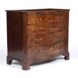 A George III mahogany serpentine chest of four long graduated drawers having brass swan neck handles