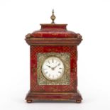 A late 19th century desk top timepiece with convex white enamel roman dial enclosed by a hinged door