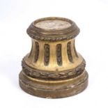 An early 19th century gilded hardwood plinth, 38cm diameter x 39cm highSome losses to the gilding