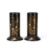 A pair of lacquered papier mâché spill vases of cylindrical form with chinoiserie gilded decoration,