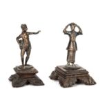 Two 19th century Burmese white metal figures, each mounted on hard wood bases. 7cm wide 11cm high.