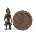 An African tribal Carved softwood Senufo figure, Ivory Coast 11cm x 35cm Together with a Yoruba