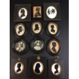 A group of ten silhouette portrait miniatures, varying subjects and sizes plus a pair of circular