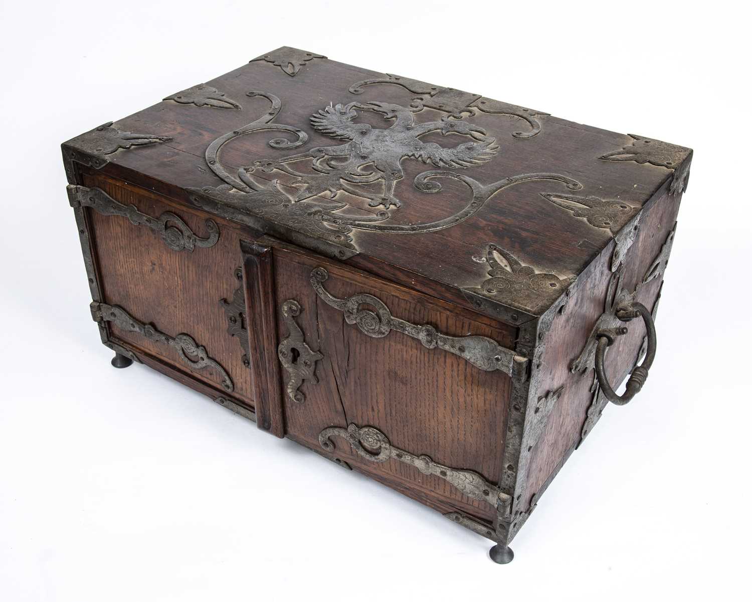 A 17th century German oak and metal bound table top cabinet of drawers, having a double headed eagle - Image 4 of 10