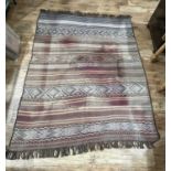 Tribal flat weave rug with linear designs on multi-coloured ground,180cm x 155cm (approx)In fair