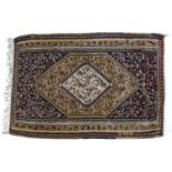 Kilim rug with one central medallion surrounded by several objects, 150cm x 103cmAt present, there