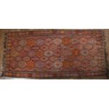 Kelim rug of red ground, with allover geometric designs, 363cm x 182cm (approx)At present, there
