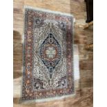 Hamadan ivory ground rug with blue medallions, 160cm x 96cmWith overall wear, particularly the