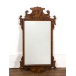 Walnut fret wall mirror 69cm x 39cmCrack to one corner.