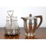 Victorian silver cruet stand with five cut glass bottles, bearing rubbed hallmarks, 20cm high