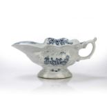 Worcester sauce boat porcelain, circa 1755-1757, painted with the 'Lake Dwellings' pattern, with