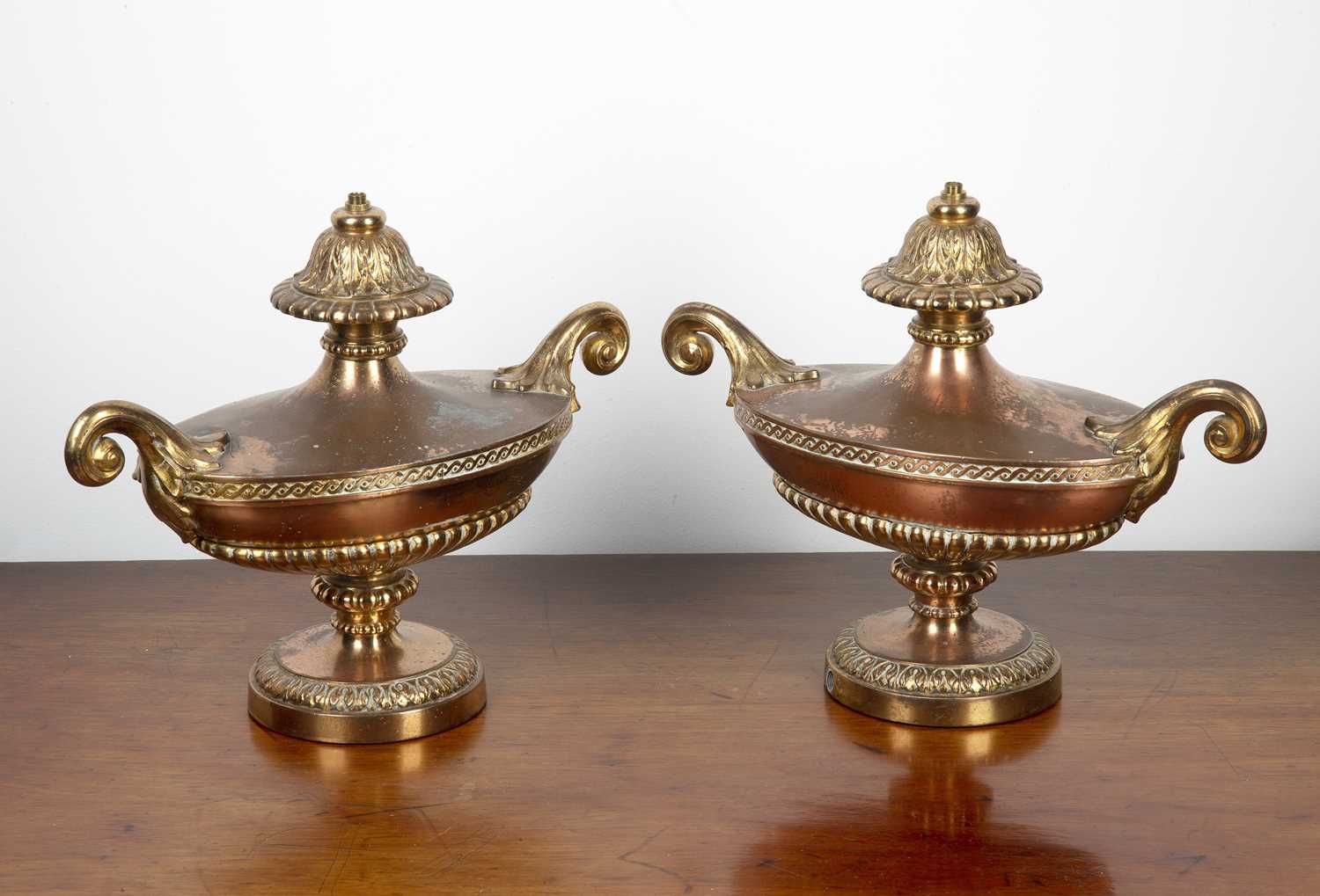 Pair of copper and brass classical style urns late 19th/early 20th Century, with acanthus leaf and